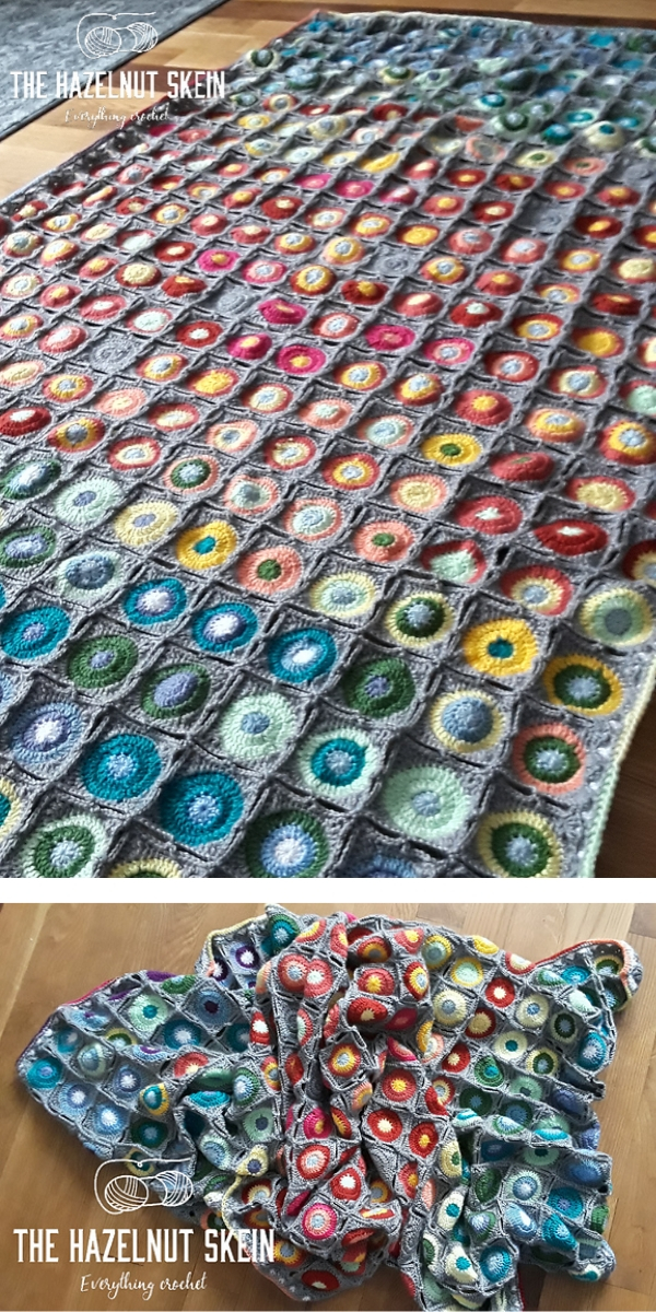 Colorful squares crochet blanket laying on the floor