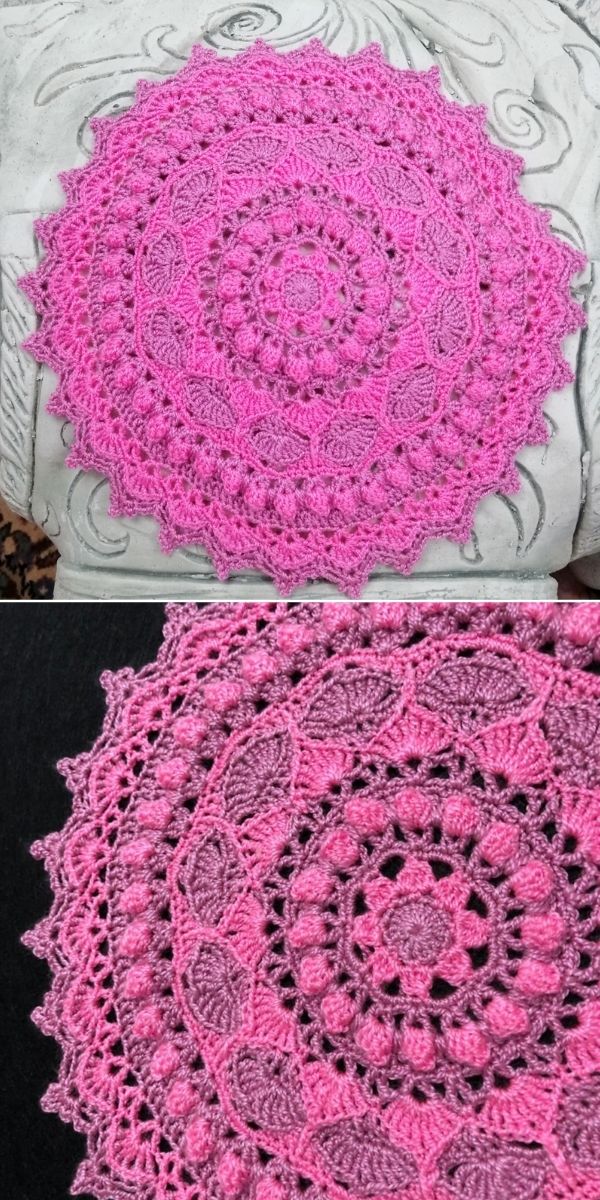 big lacy crocheted doily in bright pink color