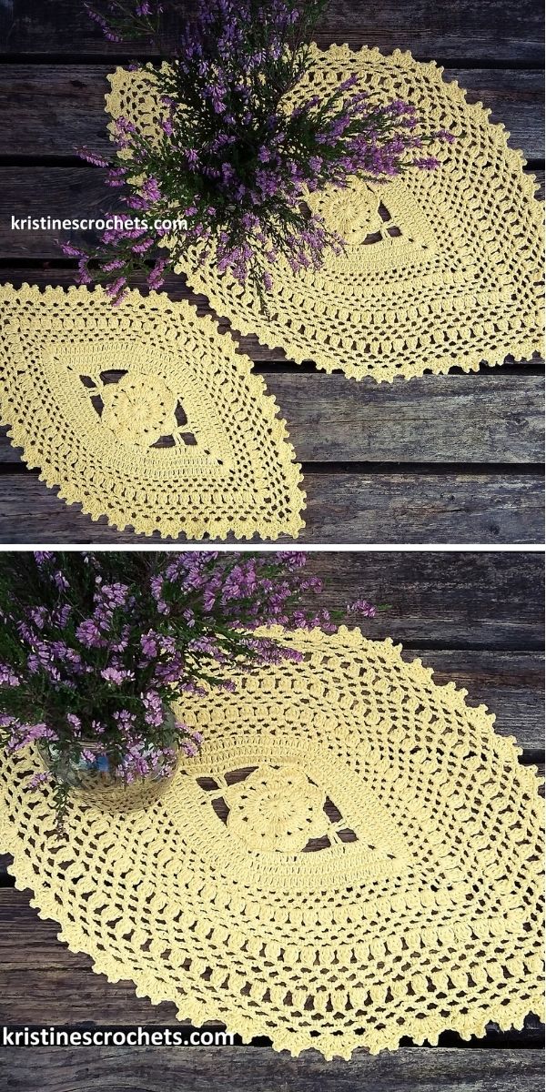 two lacy oval flower doily table mats with a small bouquet of purple heather on one of them