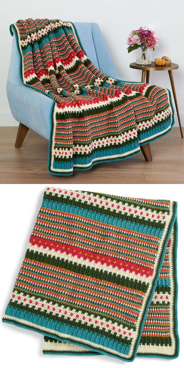 striped blanket free crochet pattern made in Christmas colors laying on the light blue armchair 