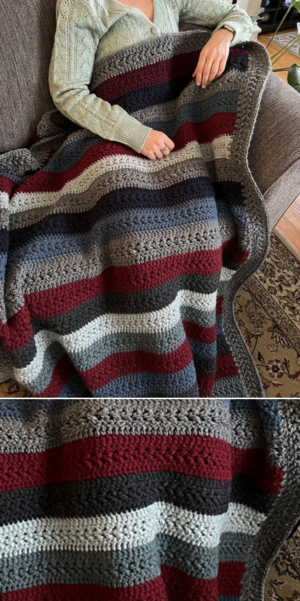 chunky crochet striped blanket covering a woman sitting in a grey armchair