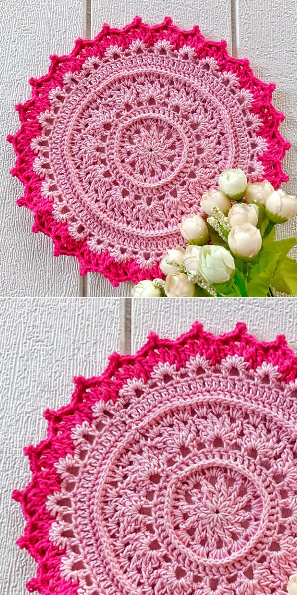 pink crochet mandala with a bouquet of white flowers on its edge