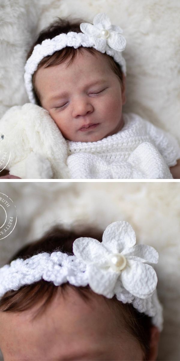 white crocheted headband for baby with a flower applique