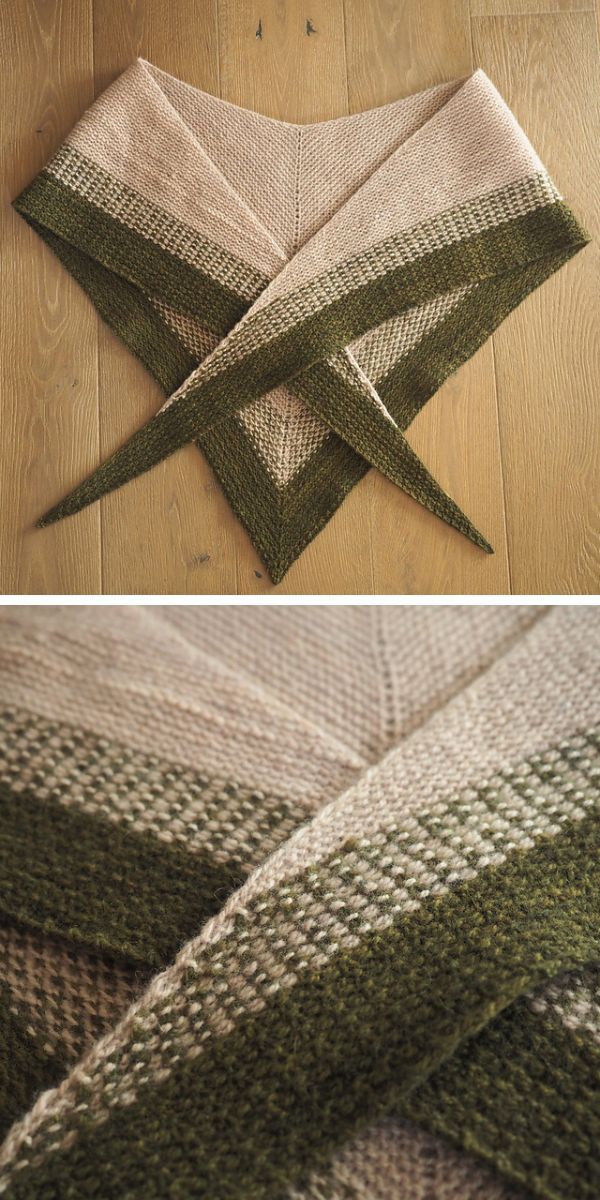 basic knitted shawl in beige color with green edging laying on the wooden floor