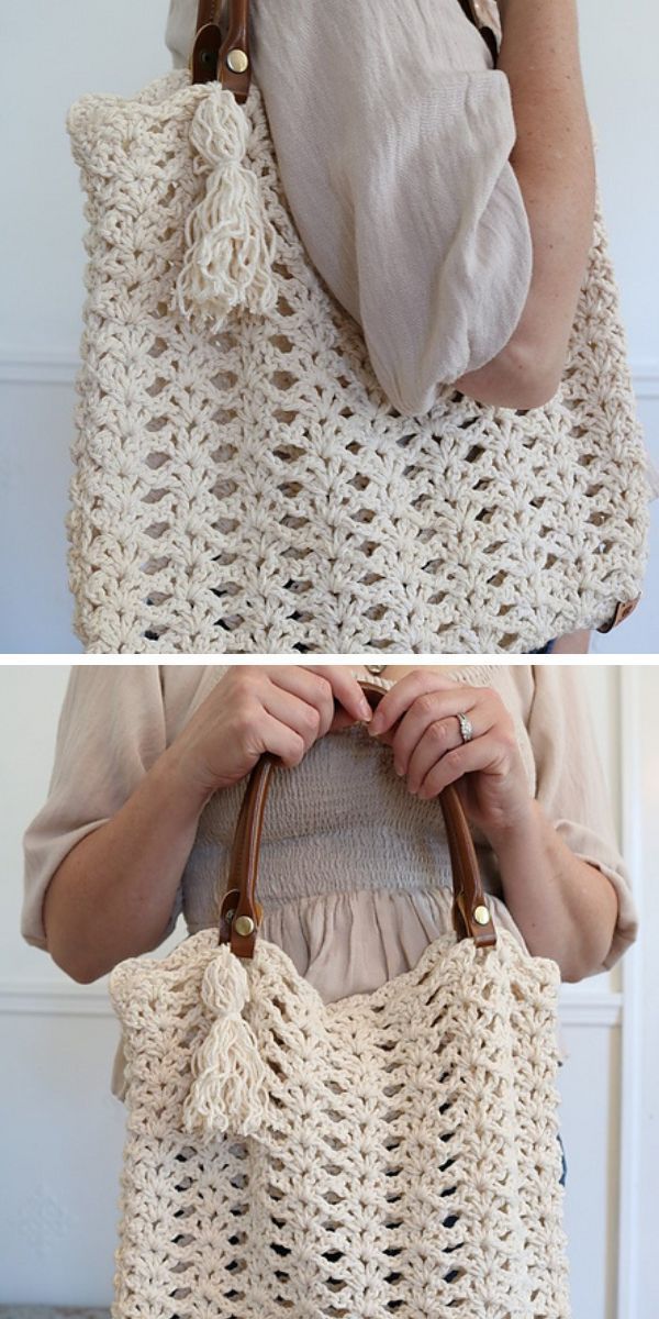 a woman holding a cream lace crochet tote bag with brown leather straps