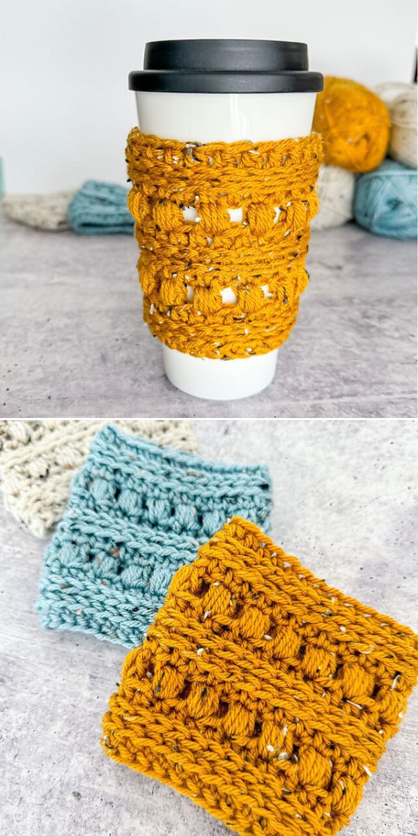A cup with a yellow crochet cup cozy.