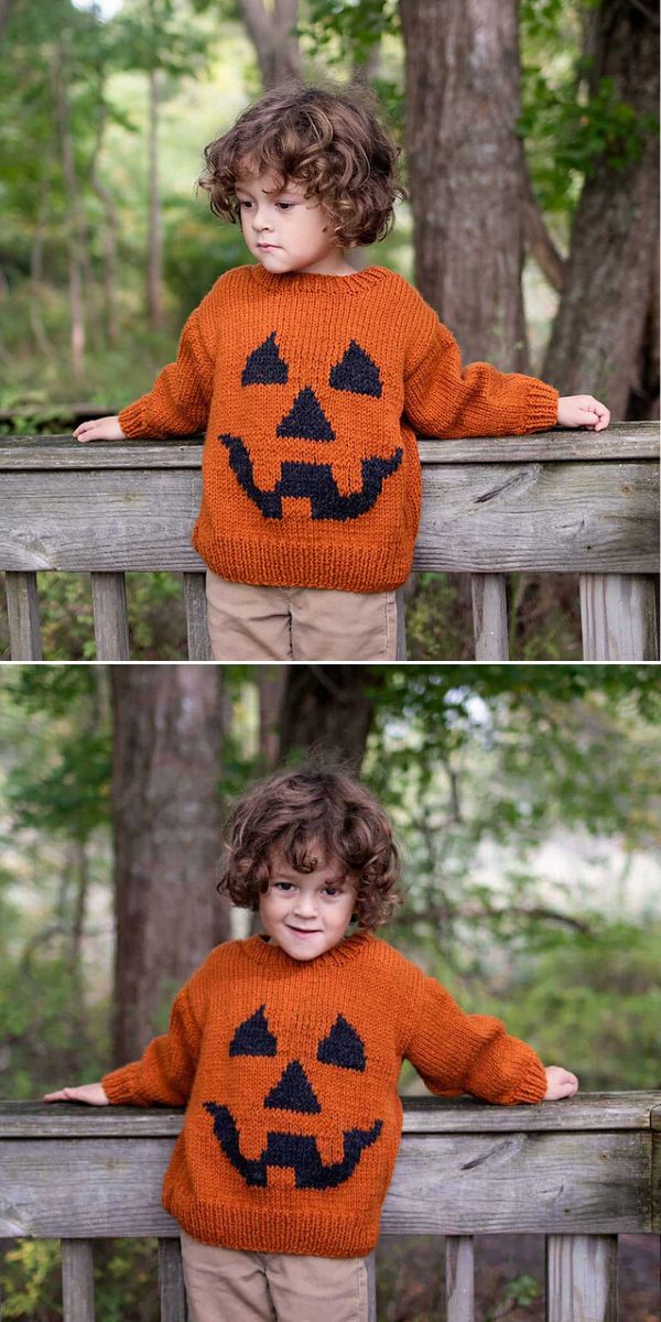 A little boy wearing a jack o lantern knitted sweater.