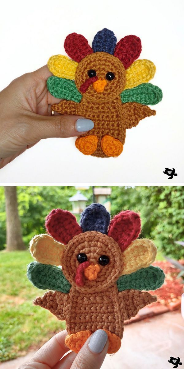 A person is holding a crocheted turkey applique.
