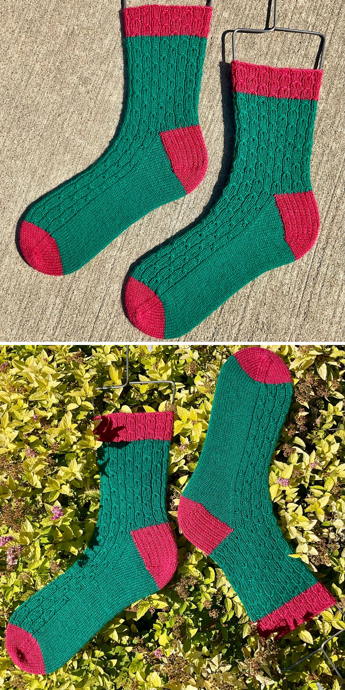 Two hand-knitted green knitted stockings with red toes, heels, and cuffs, shown laying flat on concrete and on foliage outdoors.