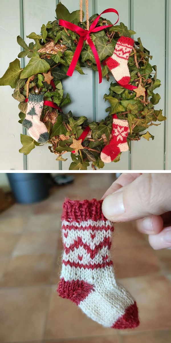 A picture of knitted stockings hanging on a wreath.