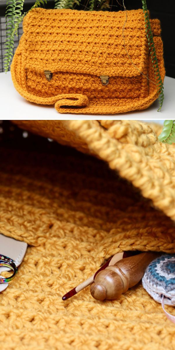 A handmade crocheted mustard yellow handbag on a shelf with crafting supplies peeking out from underneath.