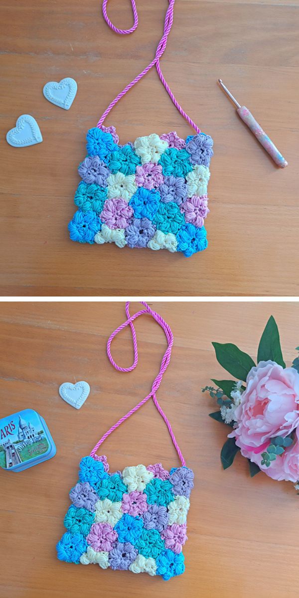 a blue crochet bag featuring a flower design