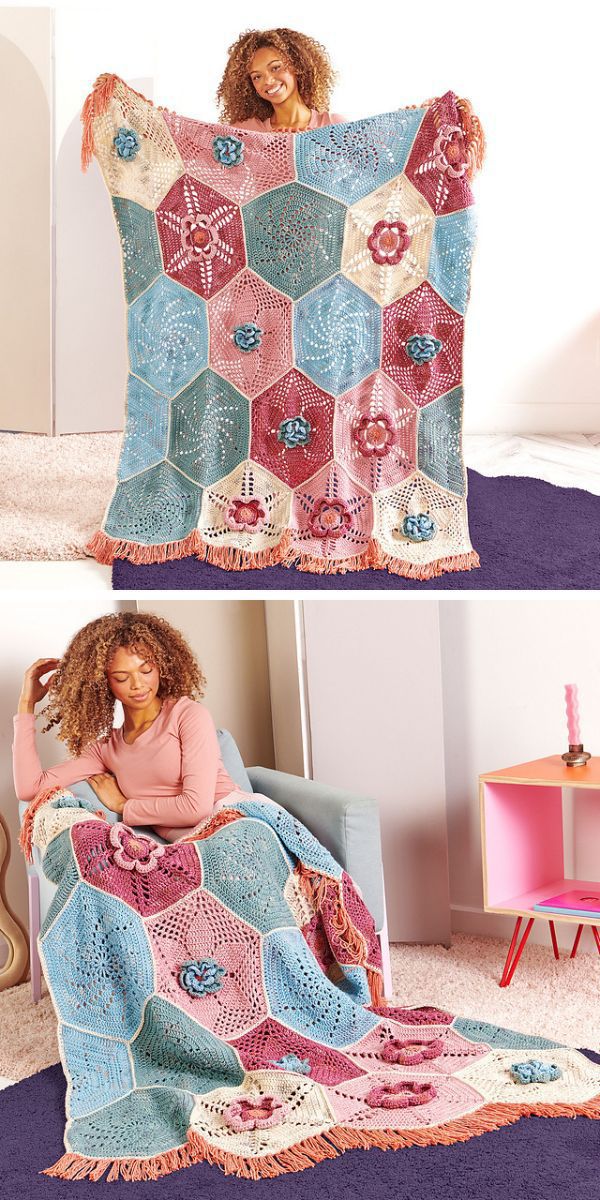 a crochet blanket made of big hexagons with floral motifs and flowers attached to it