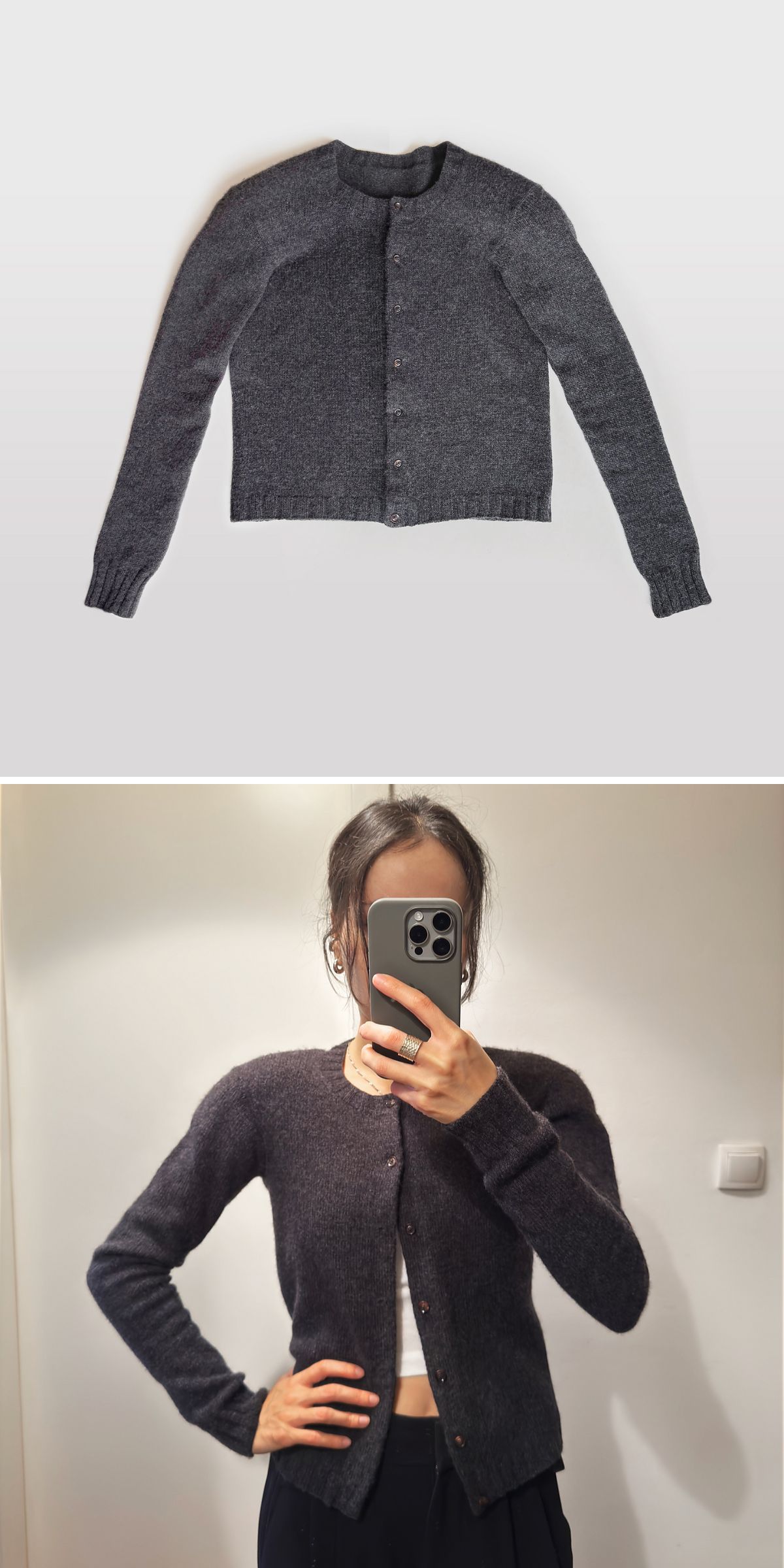 a simple dark-colored knit cardigan with buttons