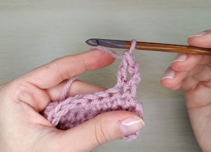 A demonstration on how to treble crochet