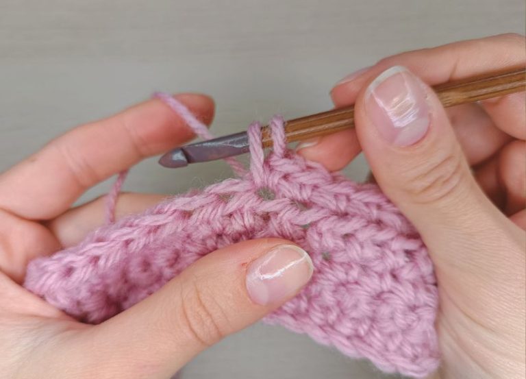 a demonstration on how to make crochet increase stitch