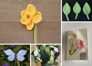 Knit creations including a yellow flower, green leaves, a blue butterfly, various small leaves in a basket, and a card with pink and white flowers.
