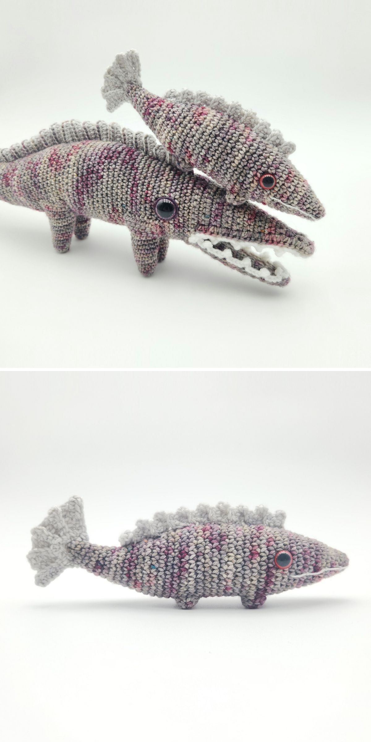 A charming crochet amigurumi toy featuring a two-headed alligator, crafted with textured gray and pink yarn against a plain background.