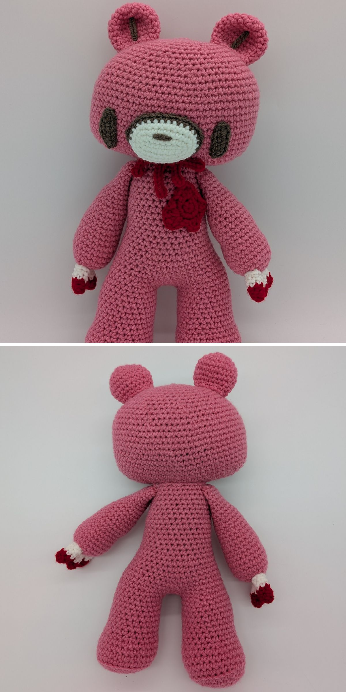 a pink large crochet teddy bear with a square head