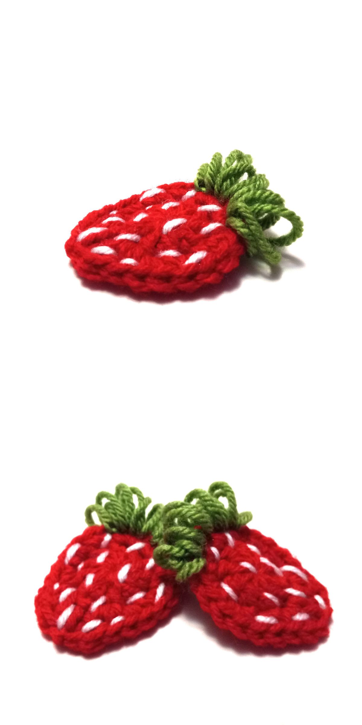 a small crochet strawberry applique