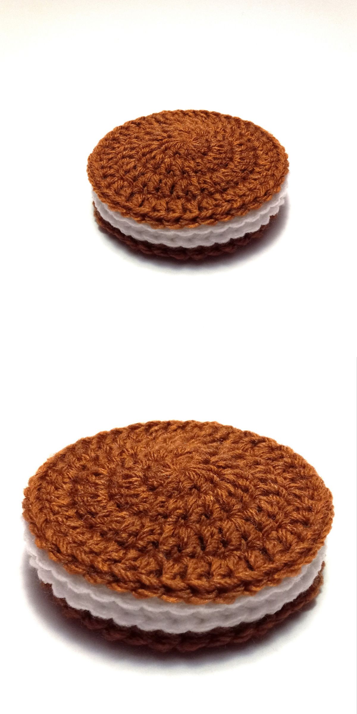 a crochet cookie with brown sides and white filling