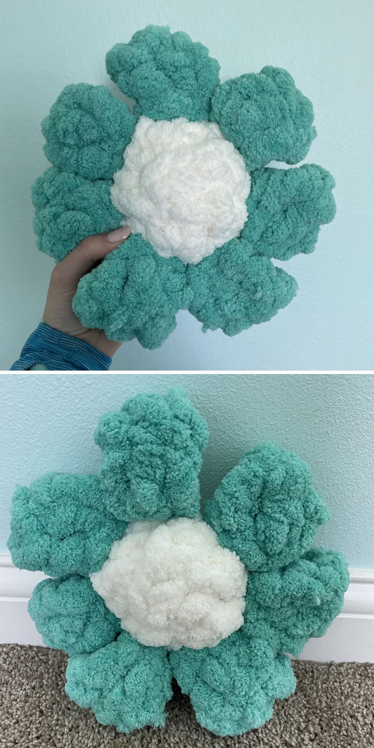a gigantic flower-shaped crochet pillow made from thick jumbo yarn