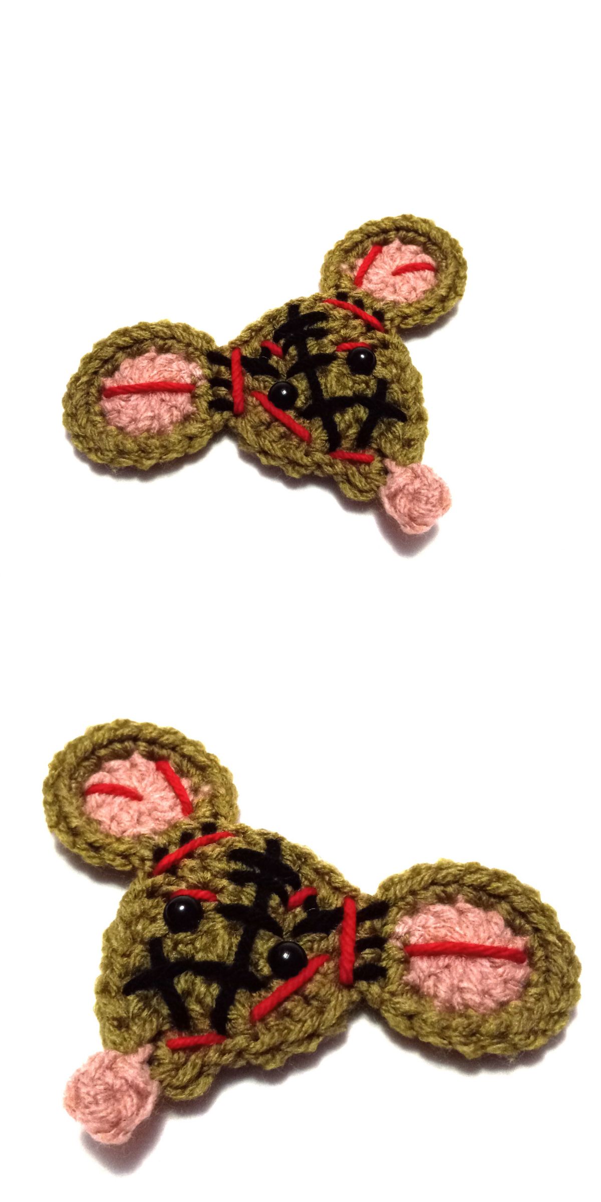 a crocheted zombie mouse applique