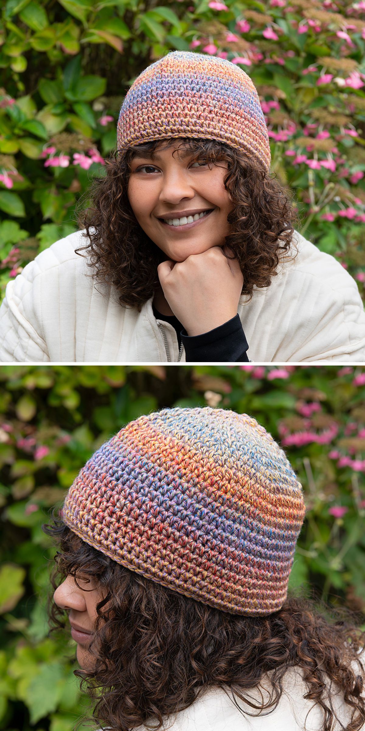 A person with curly hair wears a chunky crochet beanie, shown from the front and side, with greenery and pink flowers in the background.