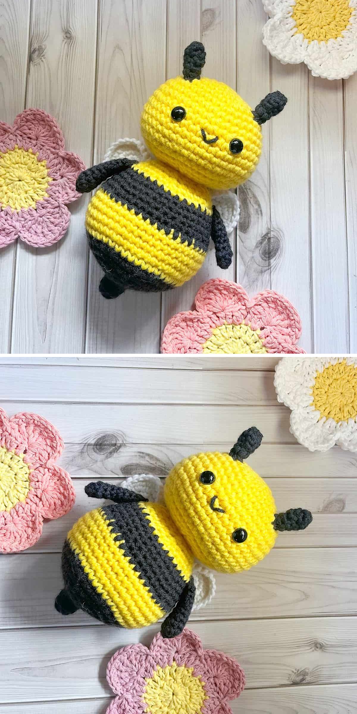 A crochet bee amigurumi, featuring yellow and black stripes and white wings, sits on a wooden surface surrounded by crocheted flower mats.