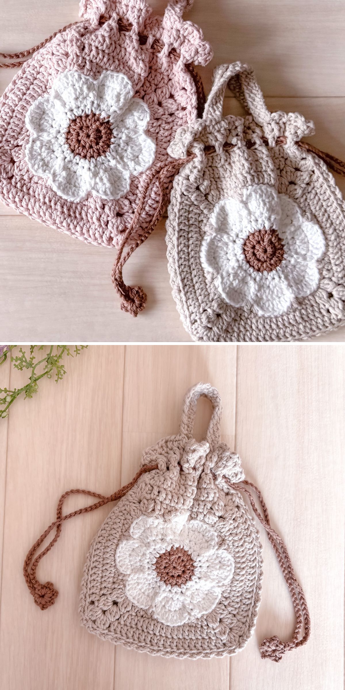 Two crochet drawstring bags with large white and brown flower patterns are shown, one pink and one beige, displayed on a light wooden surface.