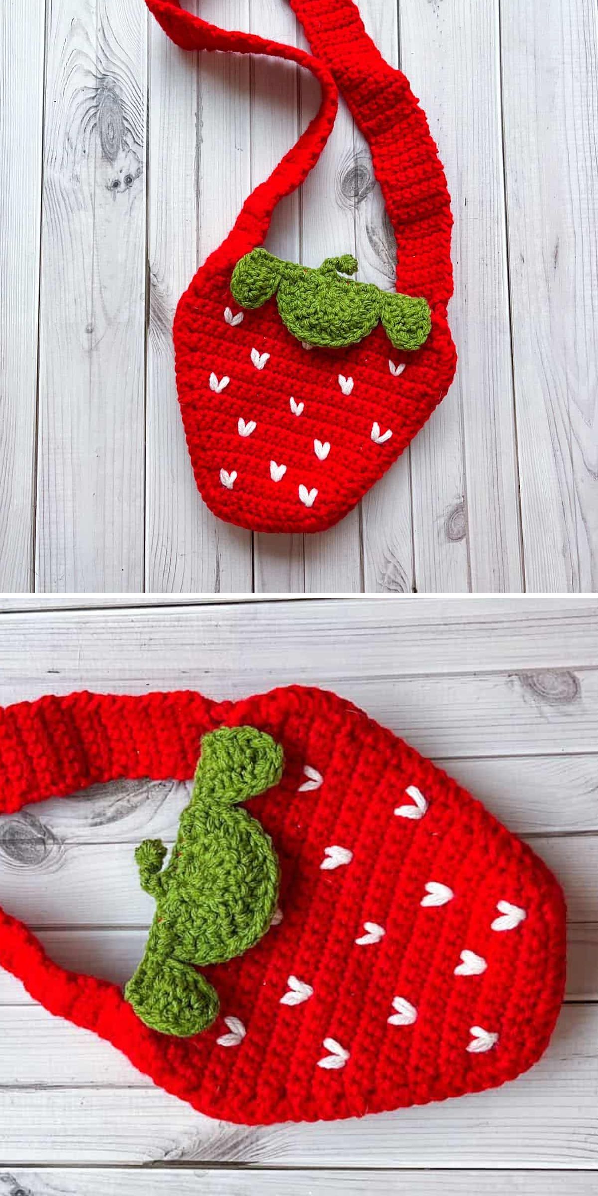 A red crochet bag for kids with white heart-shaped details and a green clasp, designed to resemble a strawberry, displayed on a wooden surface.