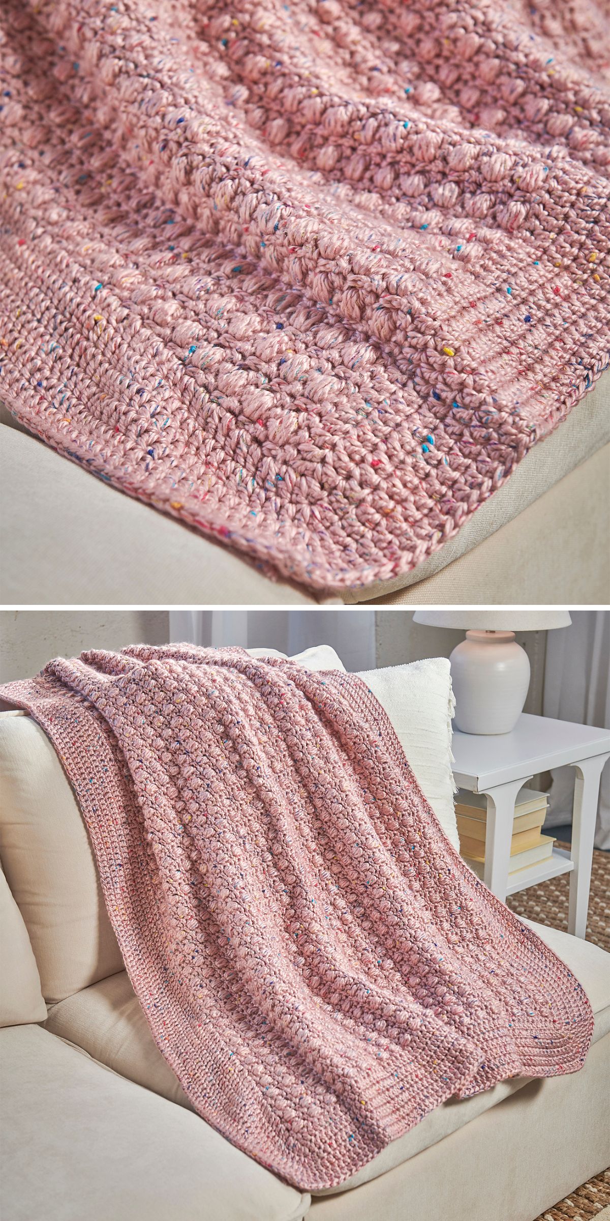 A textured pink bobble stitch blanket with multicolored specks is draped over a beige couch next to a white side table with a lamp.