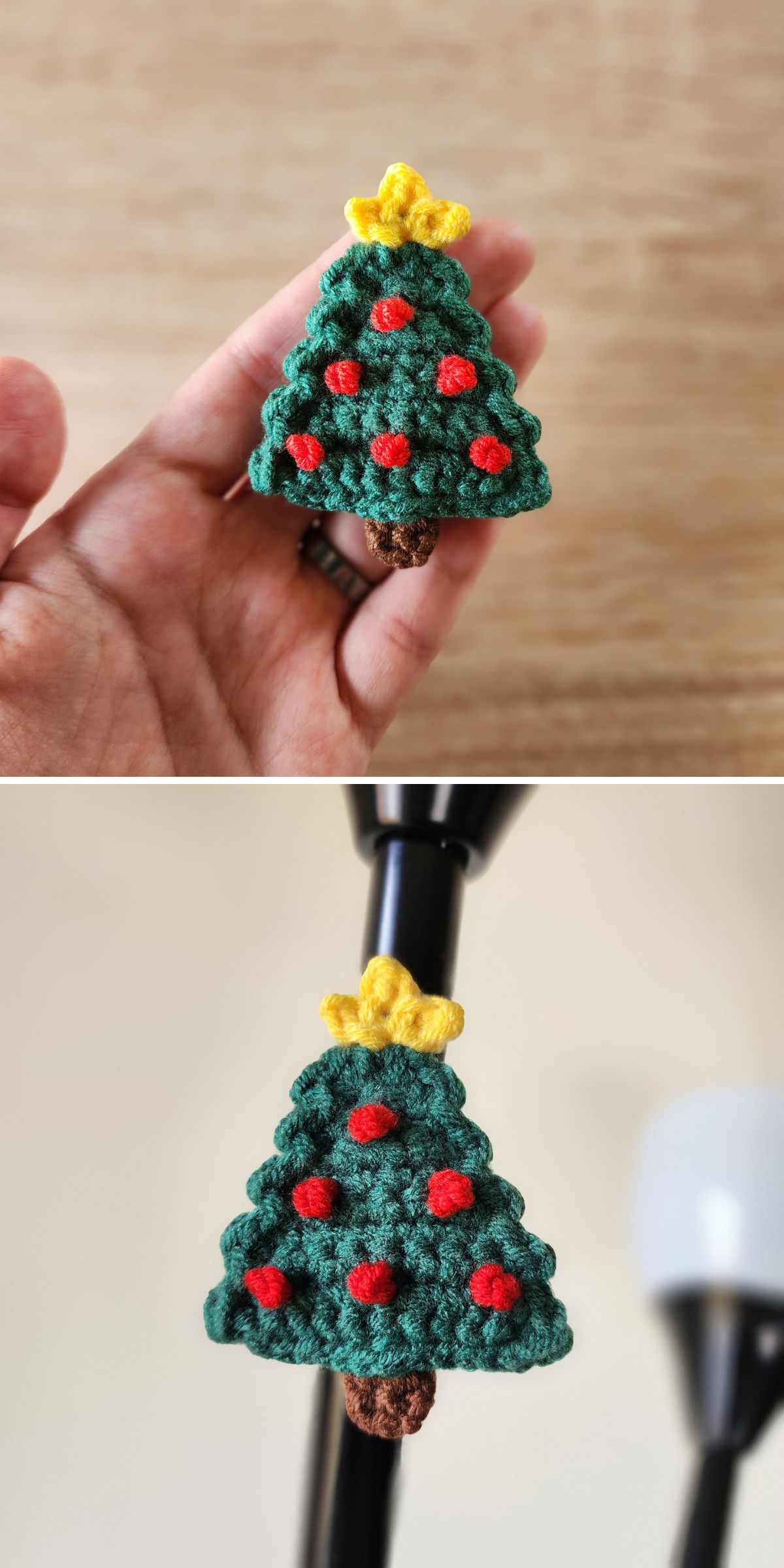 A charming crochet Christmas tree with red ornaments and a yellow star, shown held in a hand and attached to a black lamp stem.