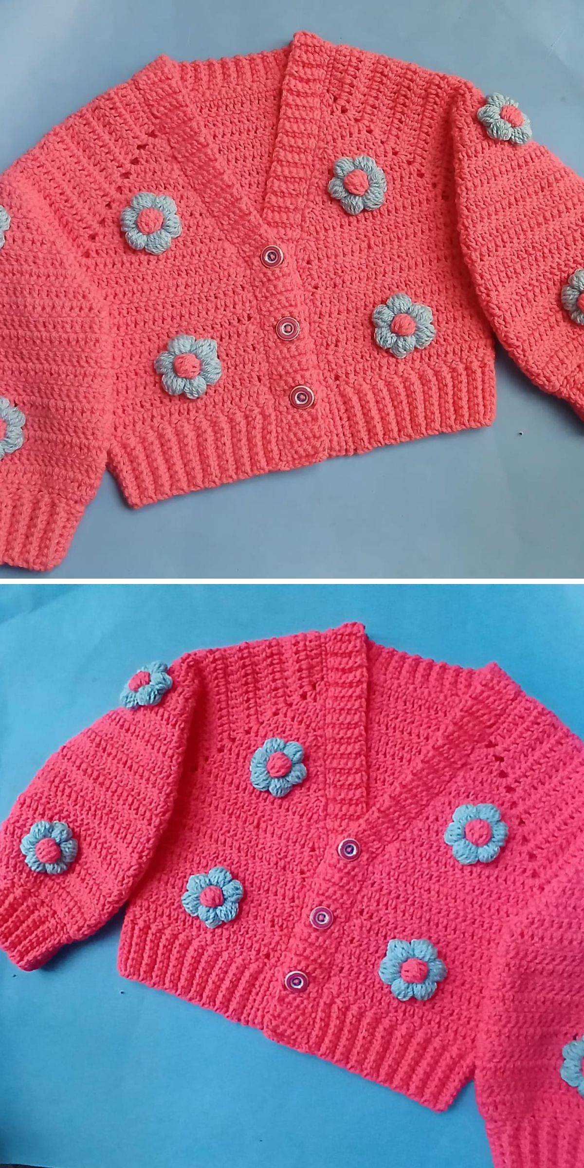 A pink crochet baby jacket adorned with blue and gray flower appliques and three buttons, displayed on a blue background.