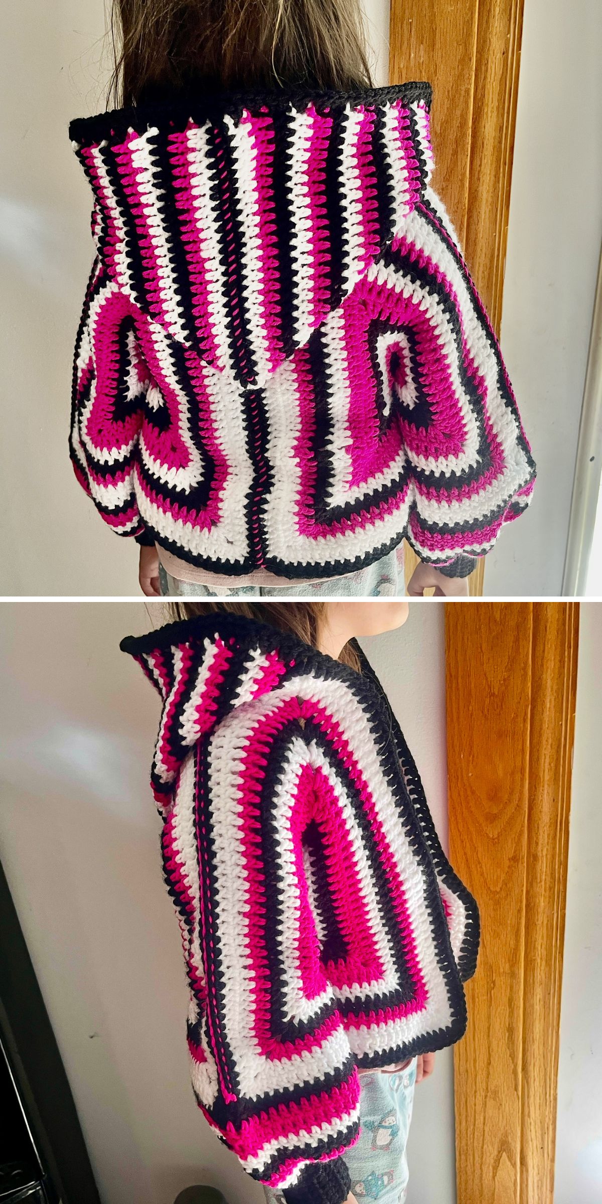 A person wears a handmade, hooded crochet cardigan sweater featuring black, white, pink, and magenta stripes, shown from the back and side angles.