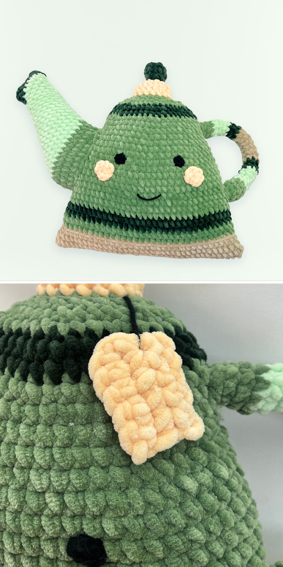 A crocheted green teapot plush with a smiling face, cream-colored cheeks, a striped handle and spout, and a yellow tea bag attached to the side — perfect as a charming crochet pillow for your cozy space.