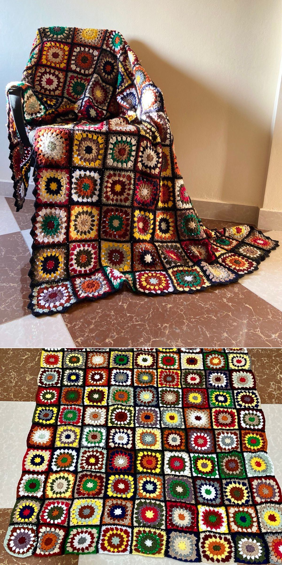 a multicolored crochet granny square blanket on an arm chair and on the floor