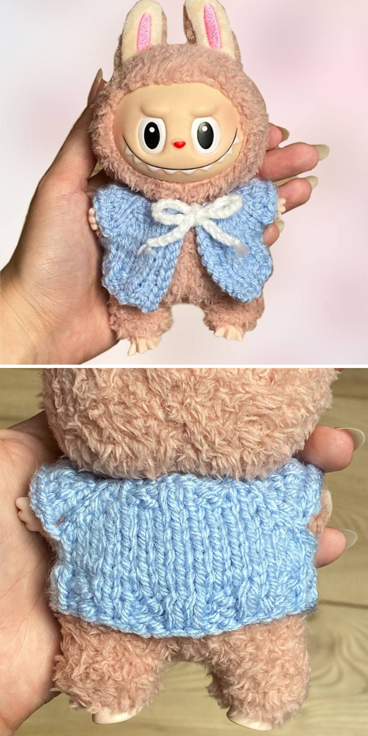 A person holds a small labubu dressed in a pink, fuzzy bunny outfit with a blue knitted cape, showcasing charming knitted clothes for dolls from the front and back.