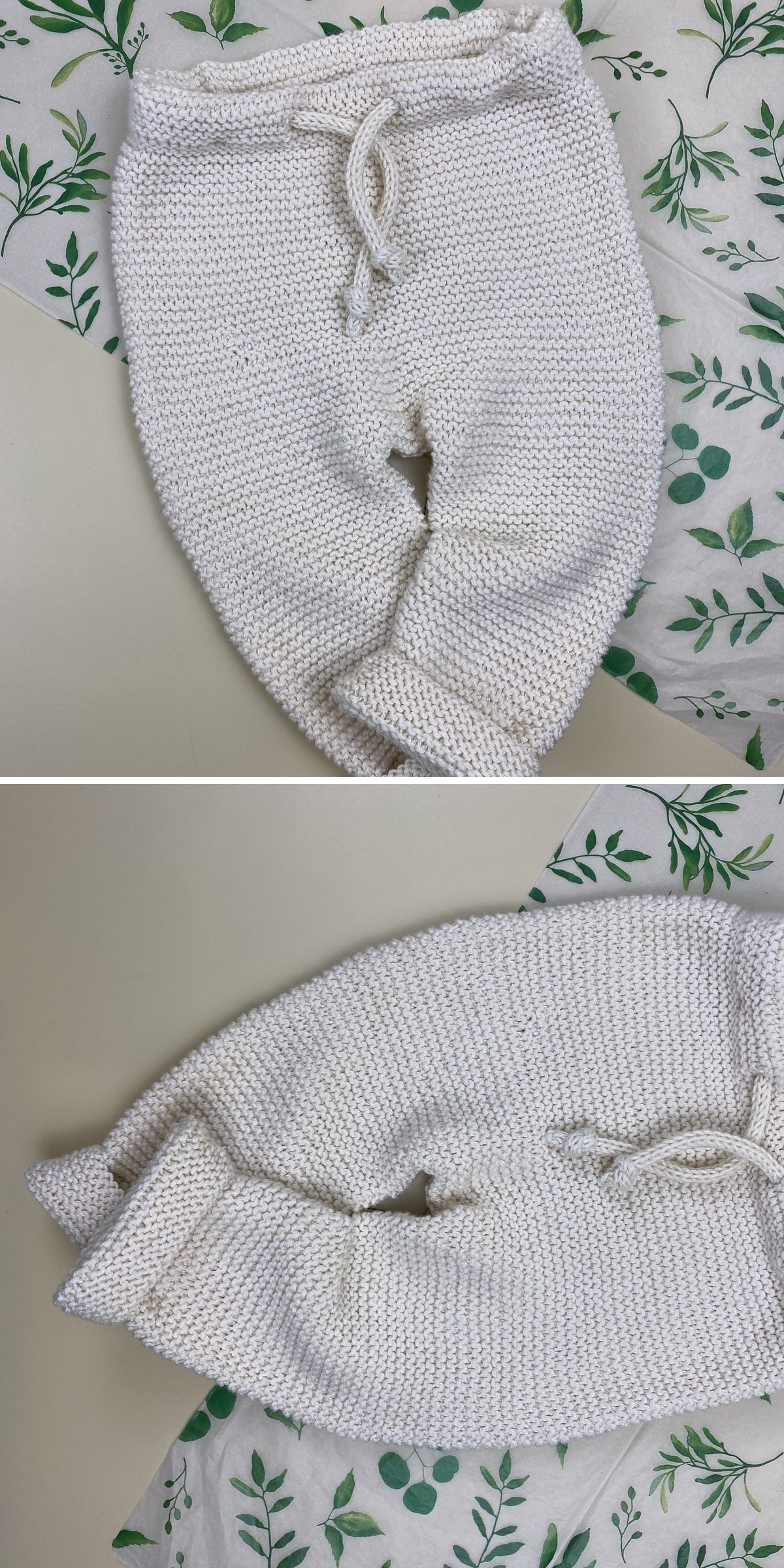 Two photos show hand-knitted white baby pants with a drawstring waist, placed on a surface next to leafy patterned fabric—an adorable addition to any collection of knitted kids clothes.