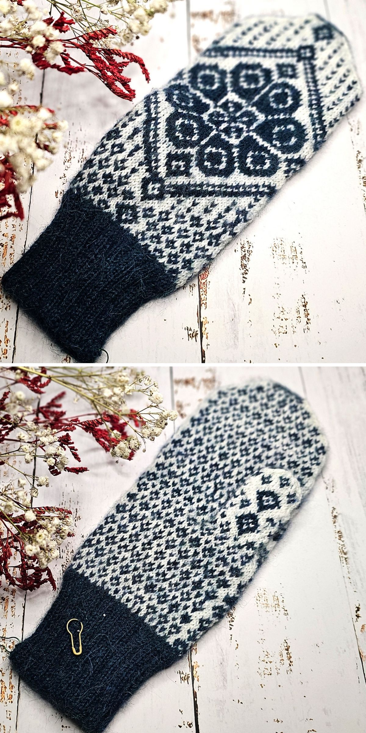 A knitted mitten with intricate blue and white geometric patterns for mittens is shown from both the palm and back sides on a rustic white wooden surface.