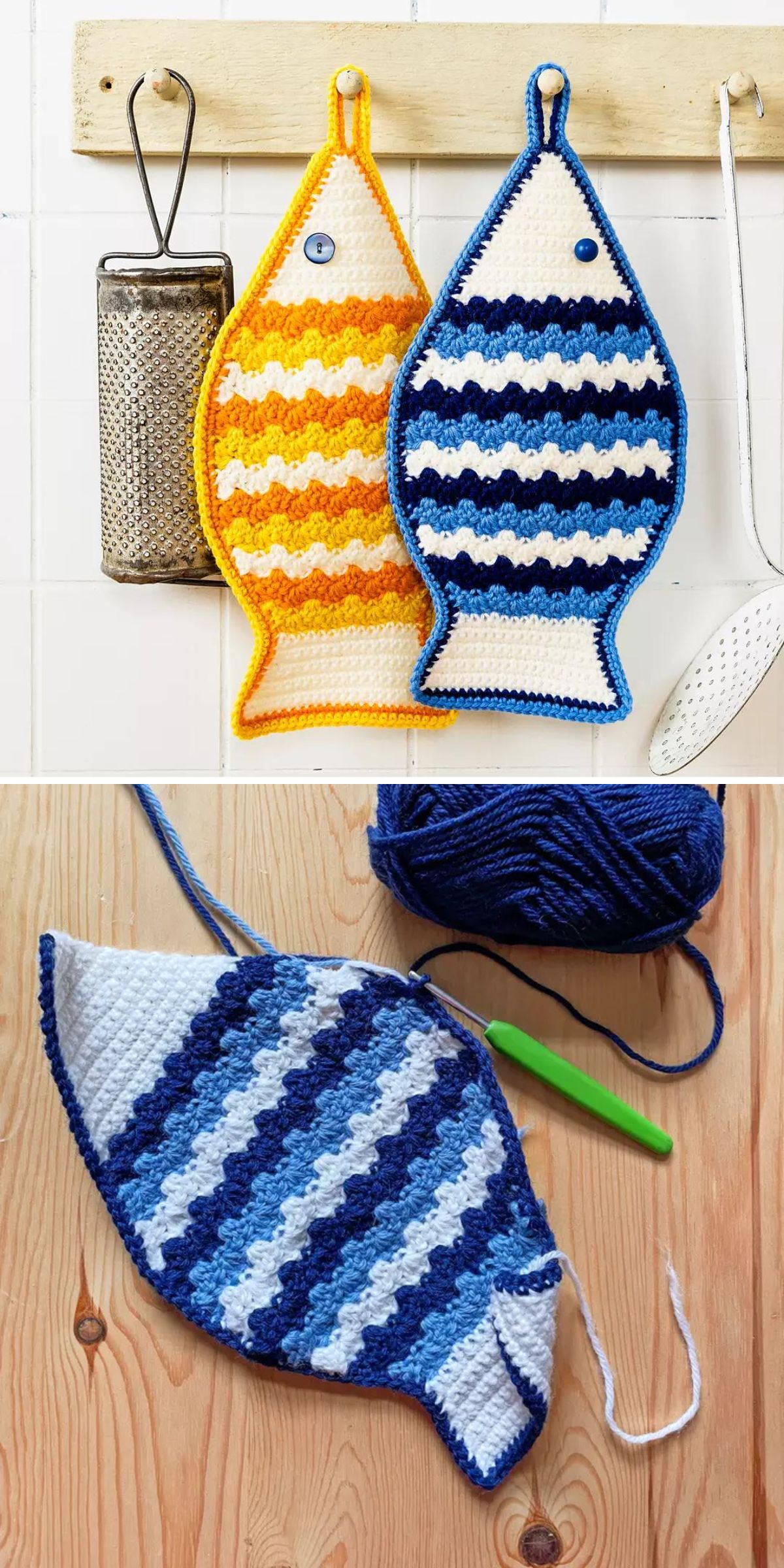 Two crochet potholder fish with wavy stripes—one yellow and white, one blue and white—hang on the wall; a third crochet potholder is in progress using blue yarn and a crochet hook.