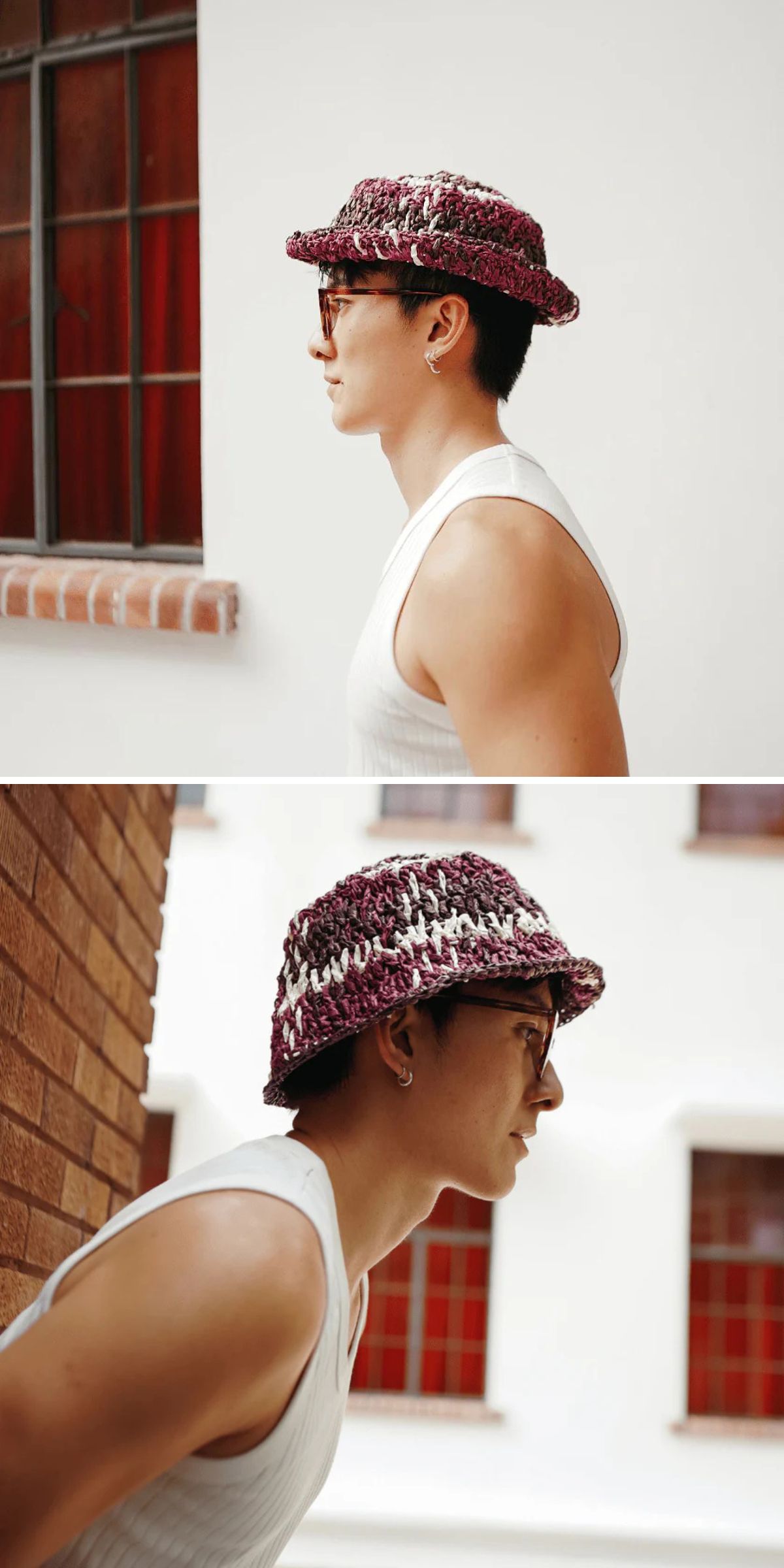 A man wearing glasses, a sleeveless white shirt, and a crocheted bucket hat — made from free crochet hat patterns — is shown in profile outdoors, standing near brick and white walls.
