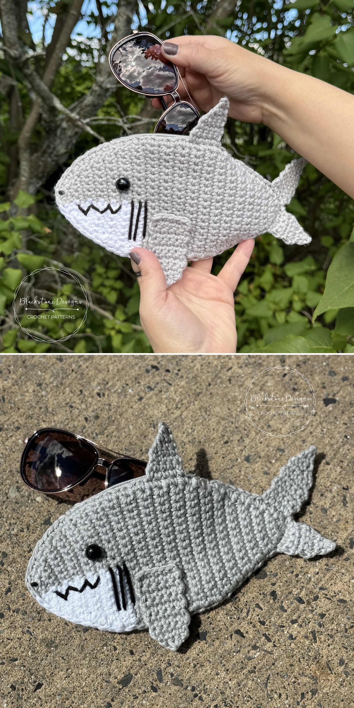 A hand holds a crocheted gray shark with black button eyes and stitched details — crafted using free crochet patterns; the same shark, perfect for carrying everyday essentials, lies on concrete beside a pair of sunglasses.