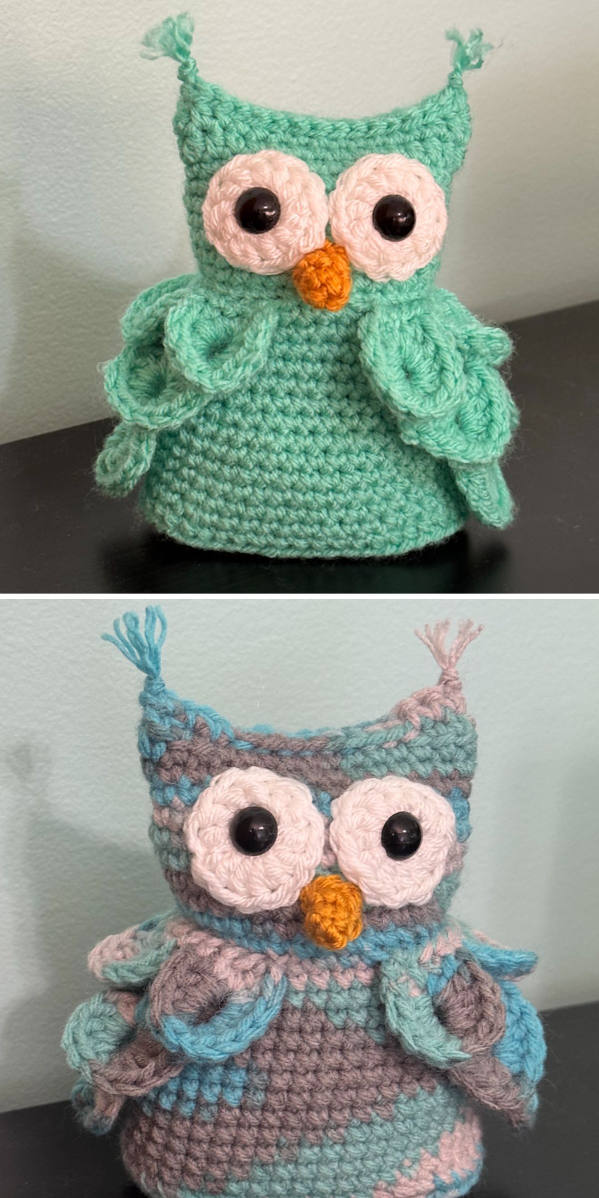 Two crochet owl toys are shown, one in solid green with a yellow beak, and one in multicolored blue and gray yarn, both with large black button eyes, sitting on a dark surface.