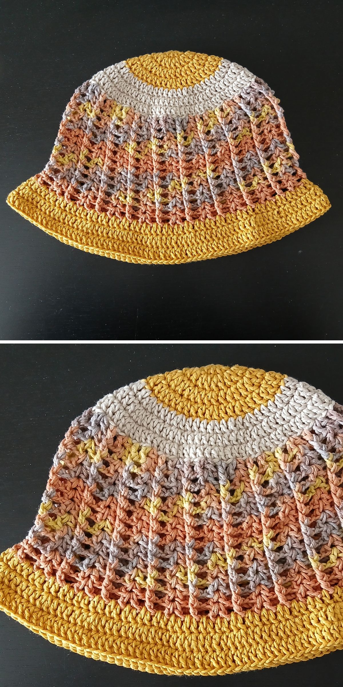 A crochet sun hat with a wide brim, featuring bands of yellow, orange, brown, and gray yarn, is displayed on a dark surface.
