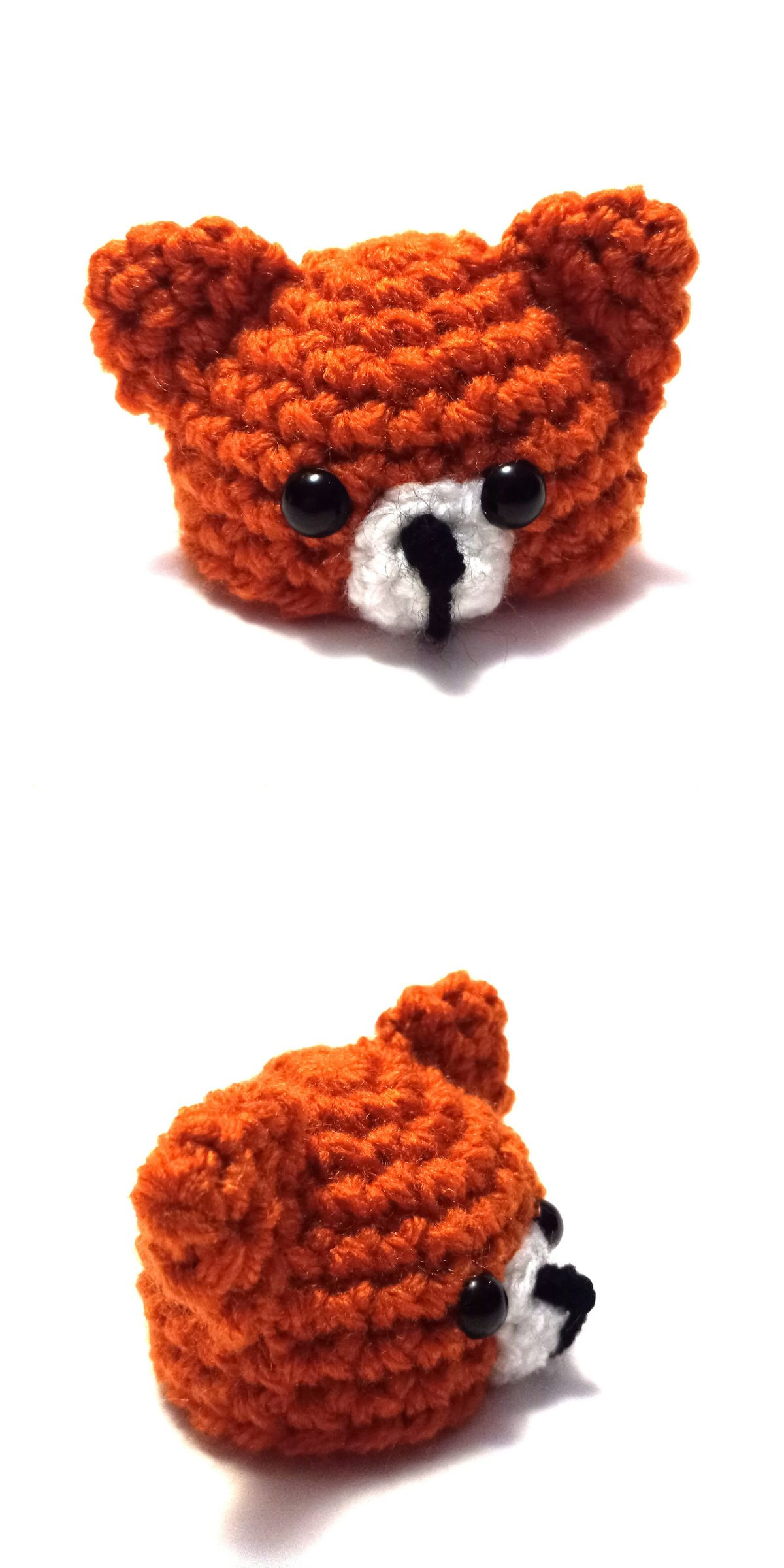 Two views of a small, crocheted orange fox hat — resembling a crochet fox — with black eyes, a white snout, and a black nose, shown from the front and side on a plain white background.