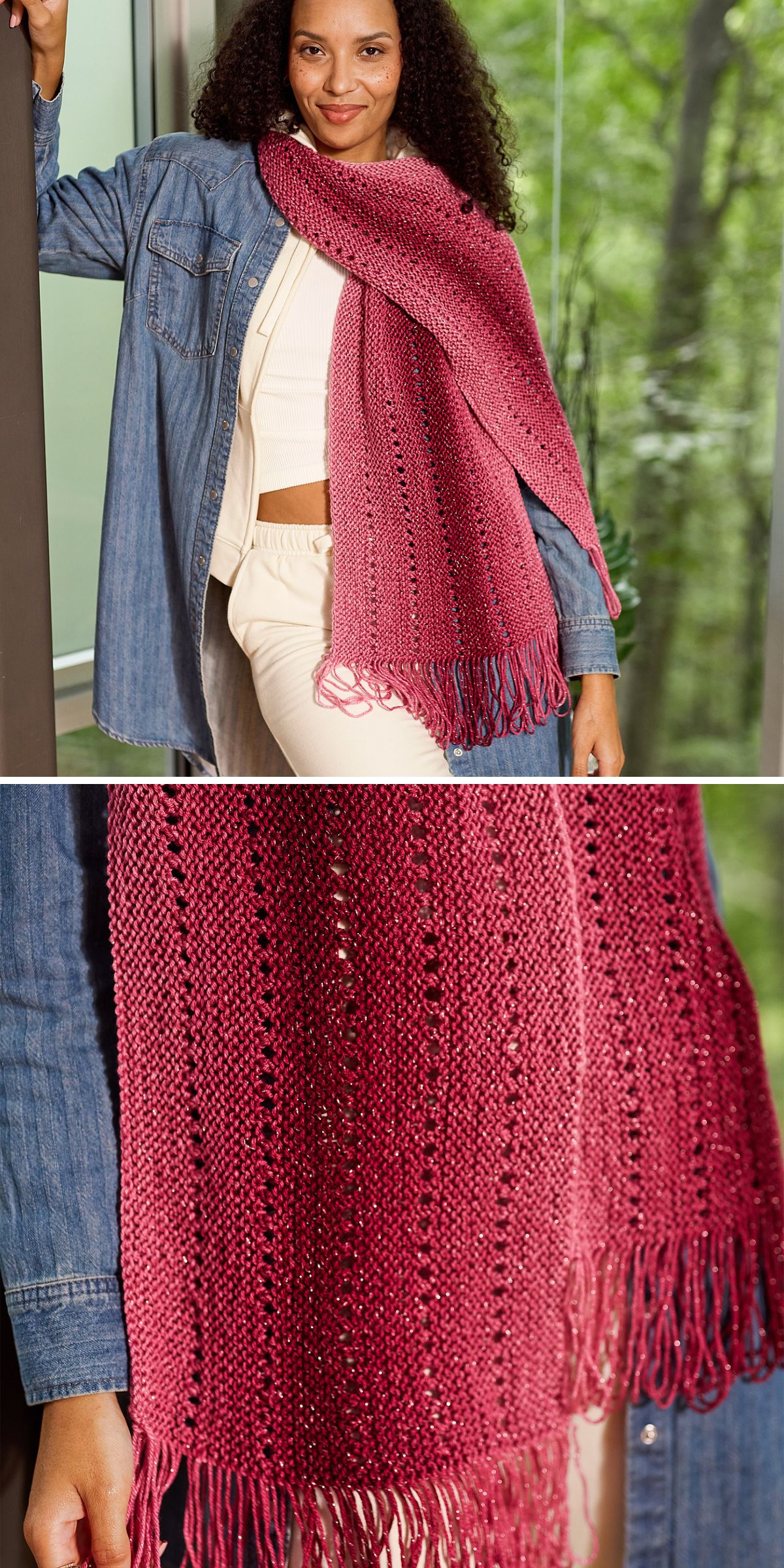 A woman wearing a blue denim shirt and cream outfit stands indoors, modeling a textured red knit wrap with fringe and eyelet details — perfect inspiration for those seeking free knitting patterns for wraps.