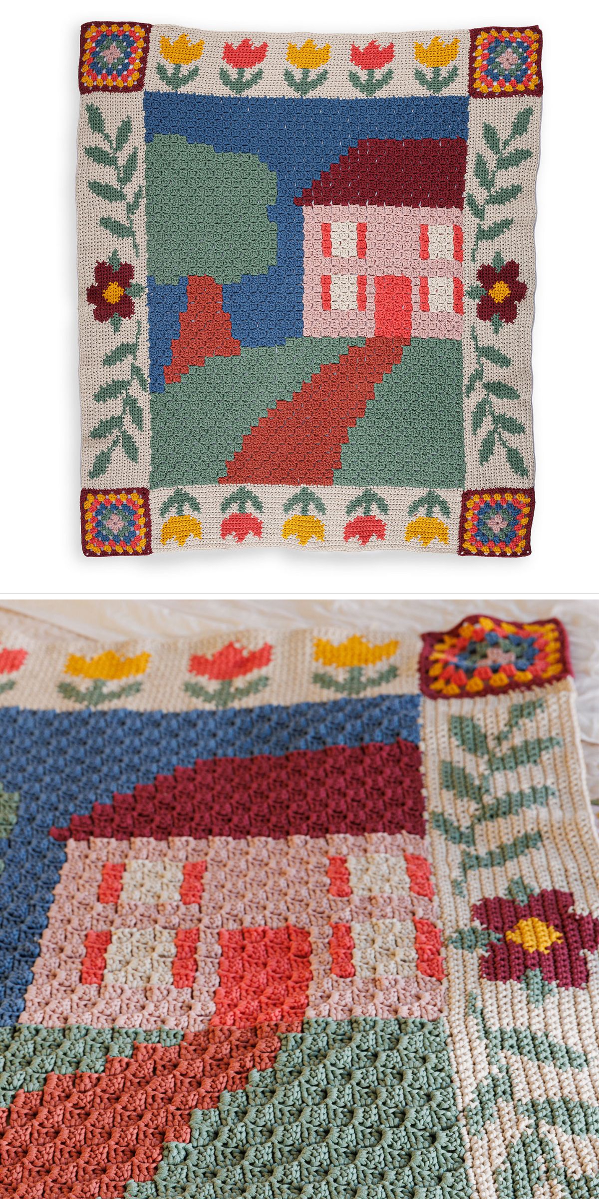 A crochet flower blanket featuring a house with a red roof, a tree, winding path, and a colorful border of flowers—perfect for adding charm to any space.