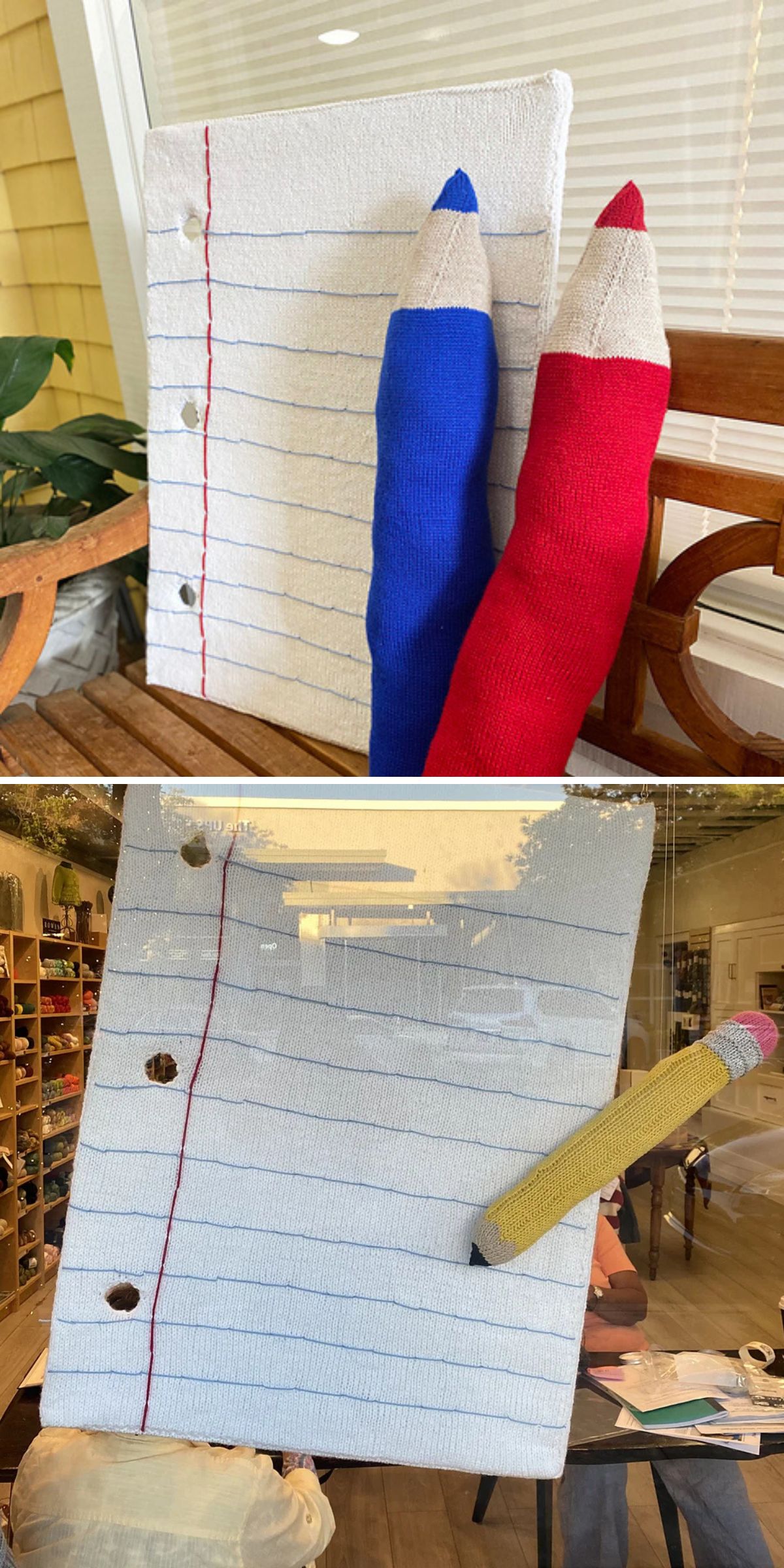 Two photos of knit toy objects: the first shows a notebook and two large colored pencils, and the second shows the same notebook with a yellow pencil, all knitted, displayed in a storefront window.