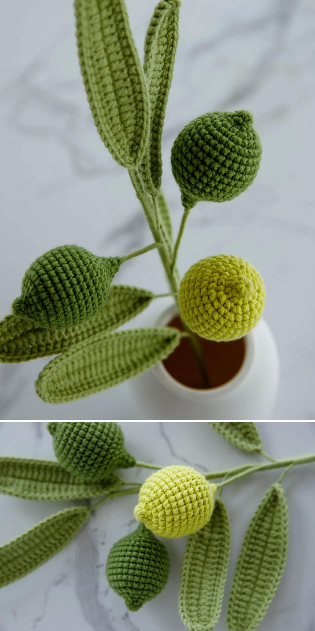 Crochet lemon and green fruits with textured leaves in a white vase, displayed on a light marble surface.